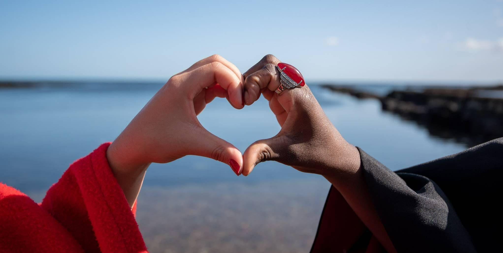 Two hands forming a heart